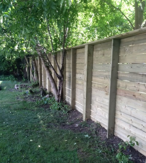 wood fence in backyard