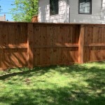 Wood Fence with Steel Posts and Cladding 