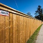 Wood fence with steel posts 